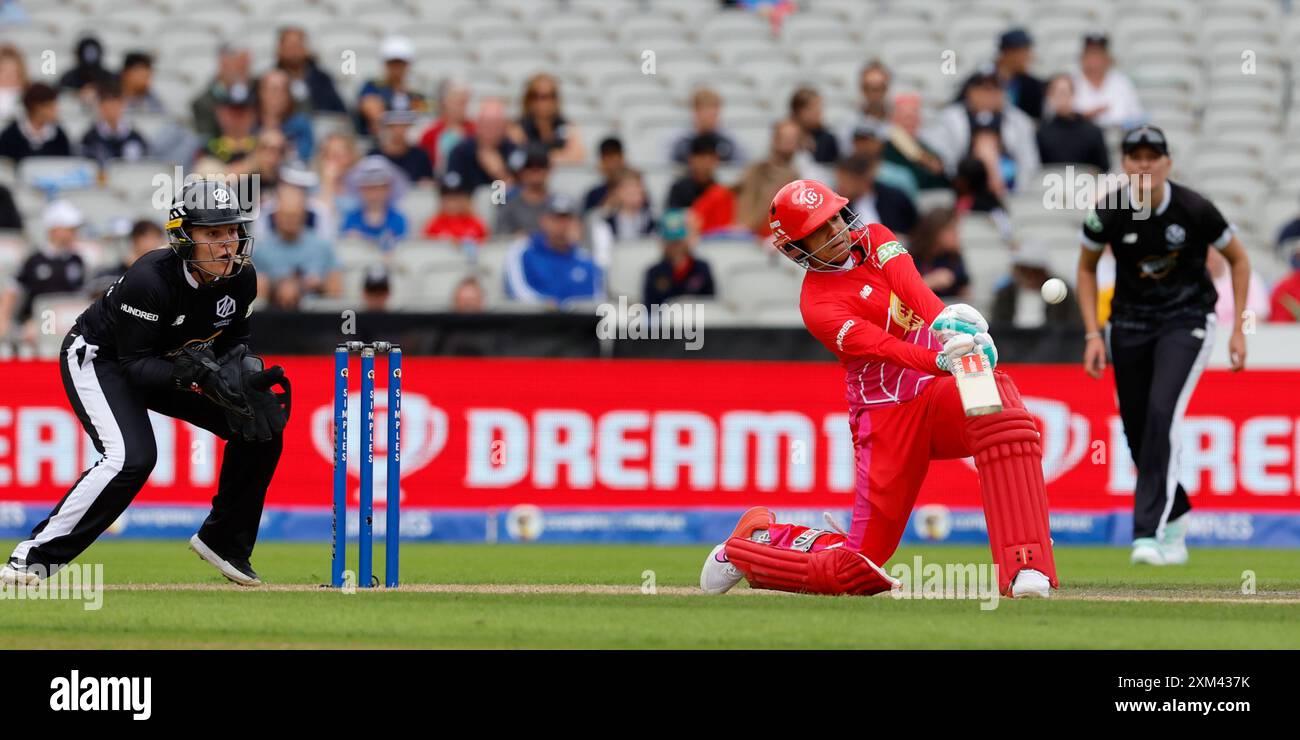 25th July 2024; Old Trafford Cricket Ground, Manchester, England; The Hundred Womens Cricket, Manchester Originals versus Welsh Fire; Sophia Dunkley of Welsh Fire launches one down the ground Stock Photo