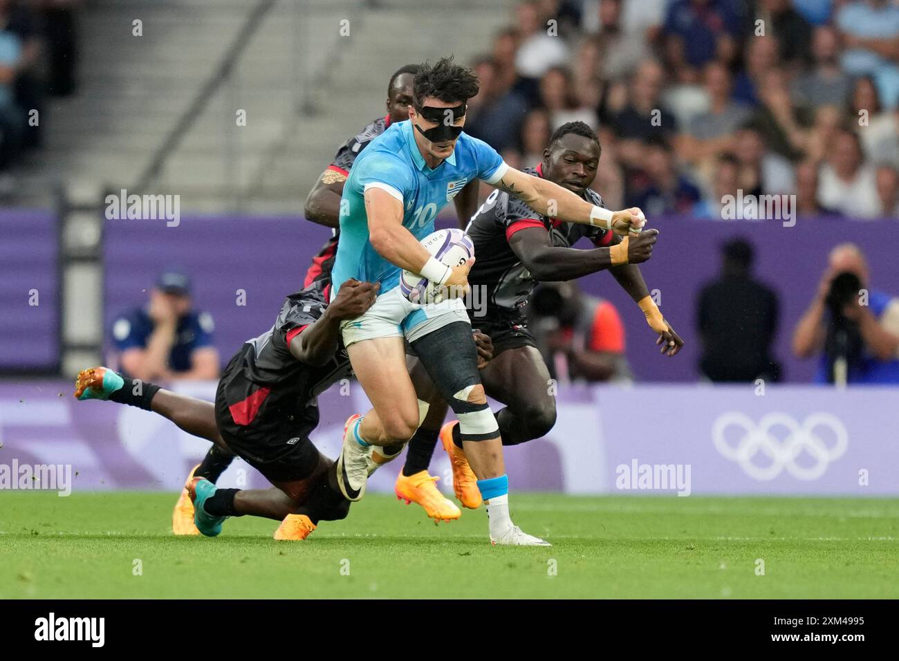 Nose Mask Rugby Uruguay's Baltazar Amaya, is tackled by Kenya's John Okeyo, left and ...