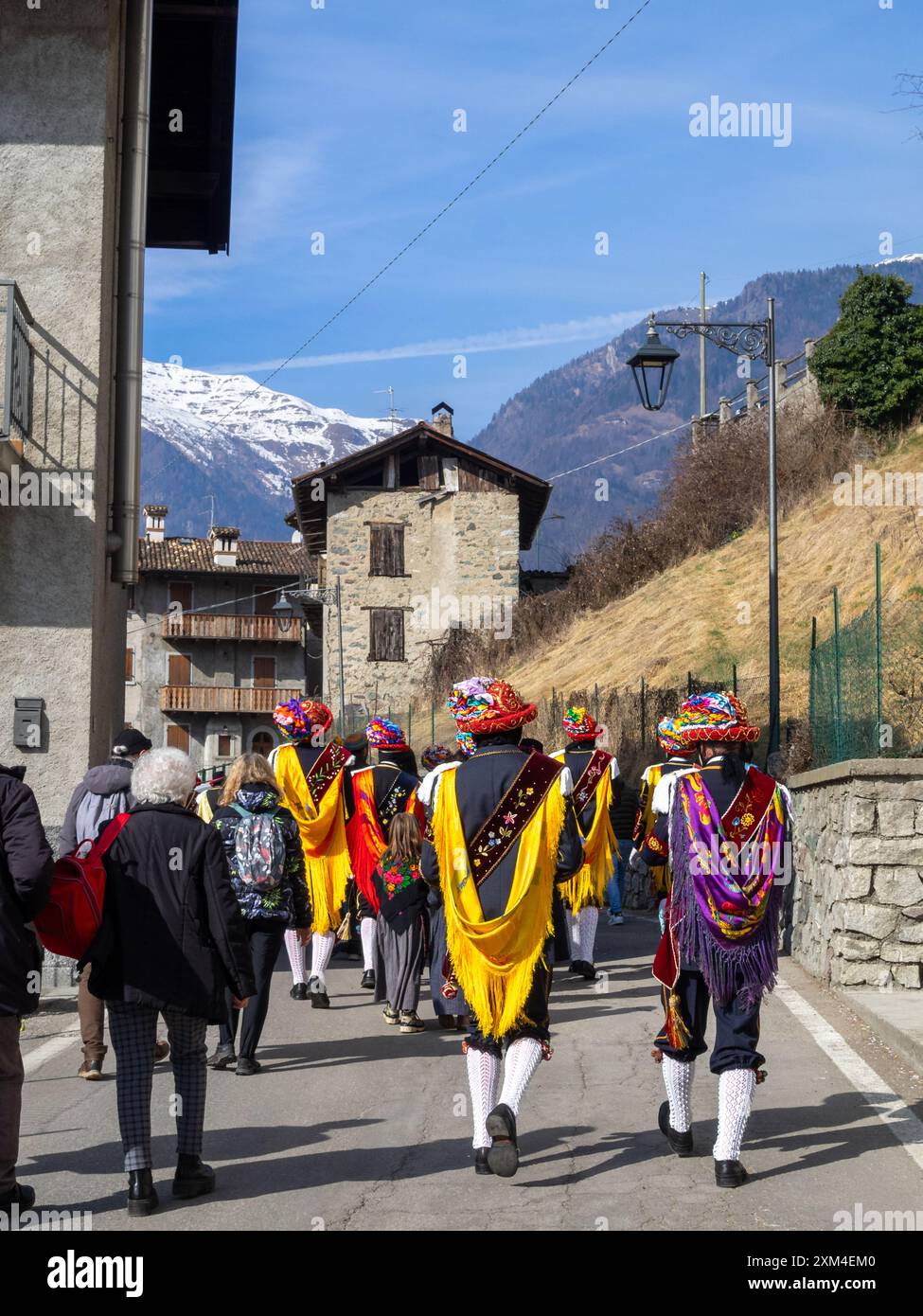 Balari walking in Bagolino street during Carnival Stock Photo