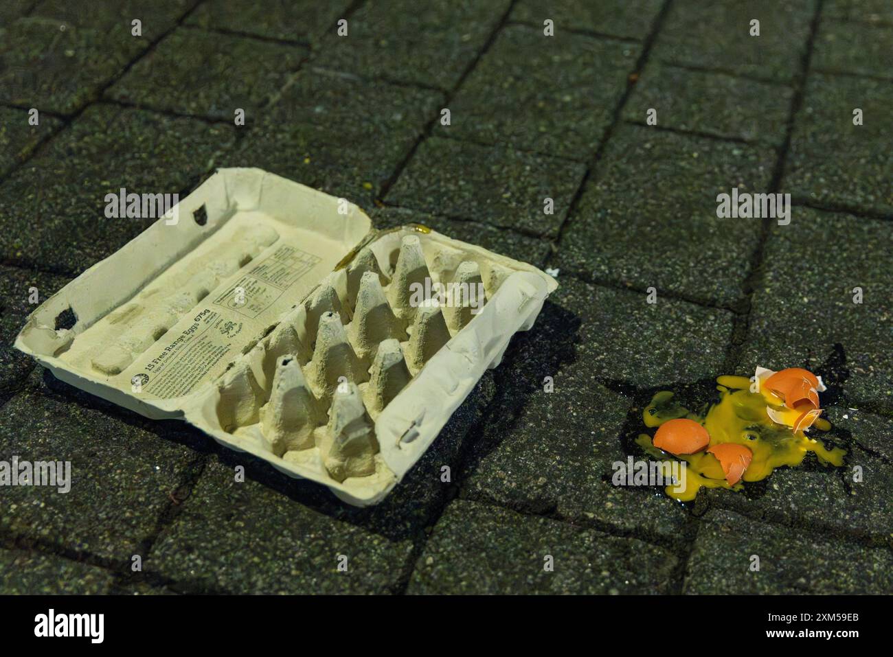 Rochdale, UK. 25 JUL, 2024. Eggs on the floor as  protestors threw eggs at Rochdale Police station in demonstration against a video released from Manchester Airport in which GMP Firearms officers were seen using force against protestors with the incident being referred to the IPCC.Credit Milo Chandler/Alamy Live News Stock Photo
