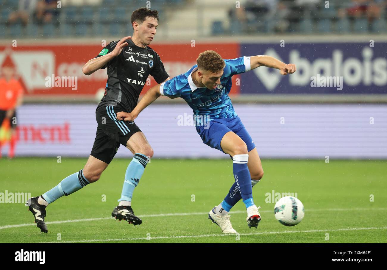 Gent, Belgium. 25th July, 2024. Gent's Mathias Delorge fights for the ball  during a soccer game between Belgian KAA Gent and Faroese Vikingur Gota, on  Thursday 25 July 2024 in Gent, the
