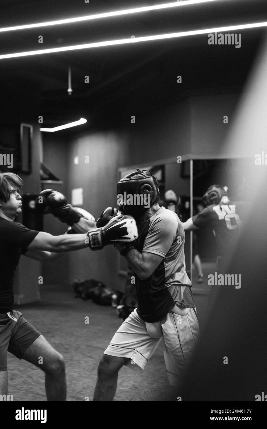 Boxers fighting in boxing training in the gym. Stock Photo