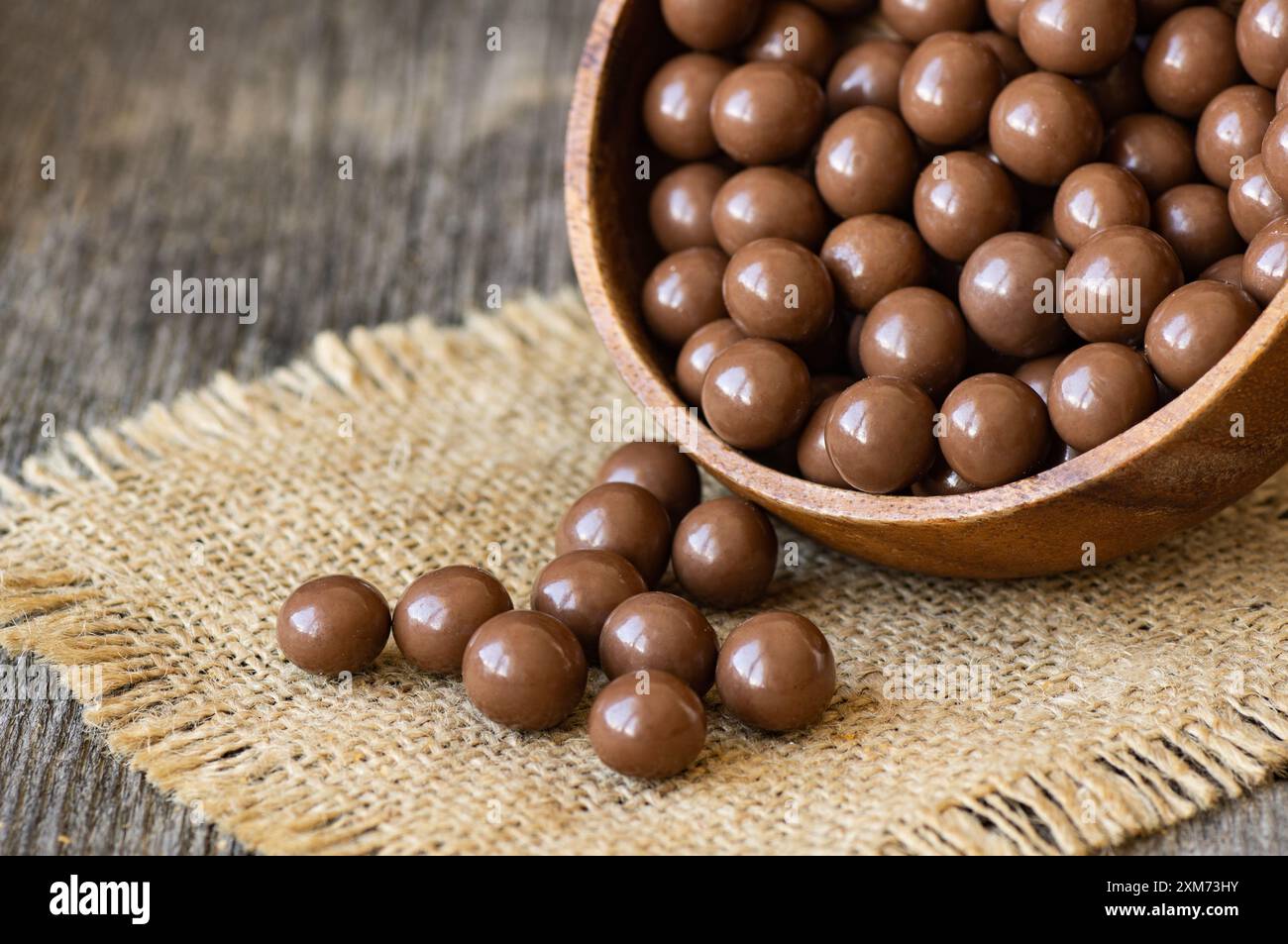 Chocolate covered chickpea, turkish traditional nuts, round small confectionery Stock Photo