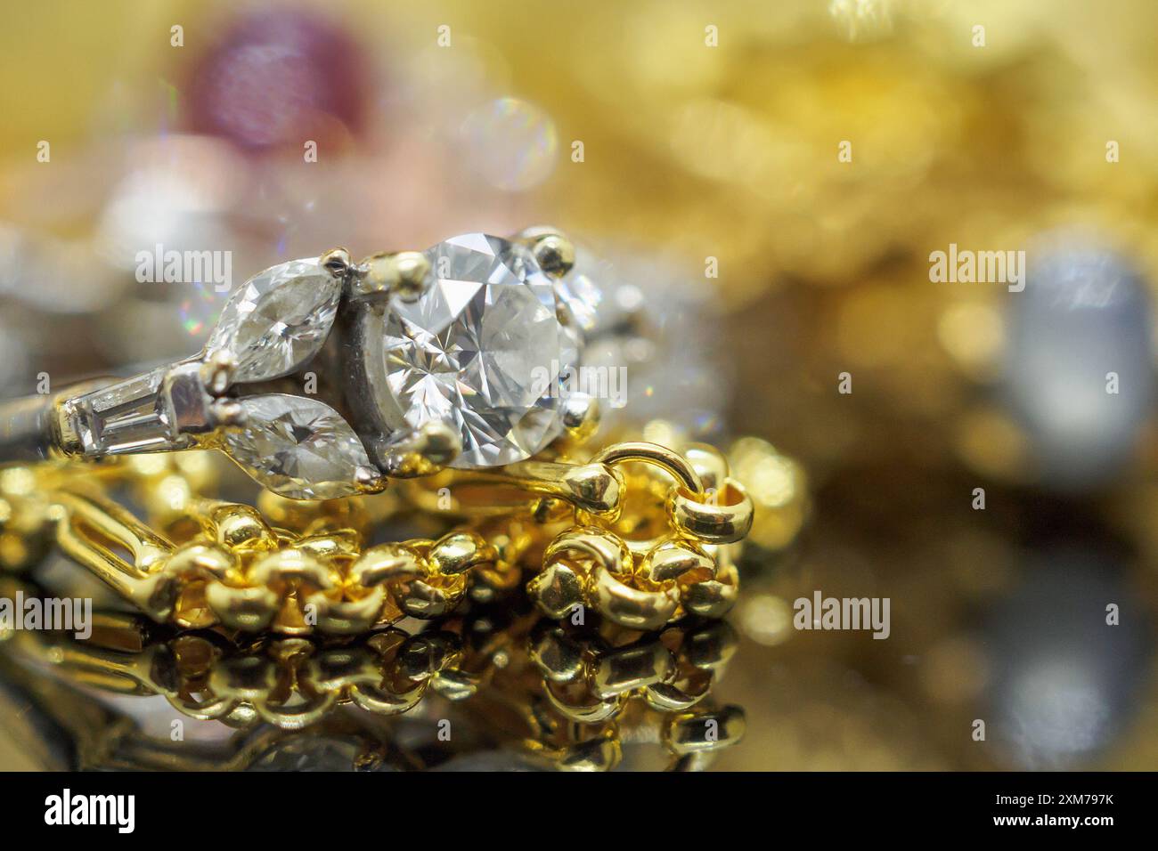 Luxury gold Jewelry diamond rings with reflection on black background ...