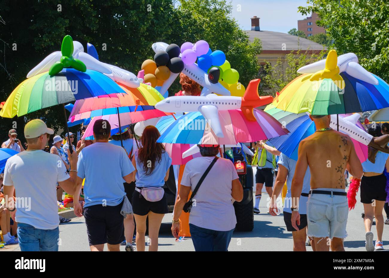 Participants in the 2024 Halifax Pride Parade. Corporate float for Air ...
