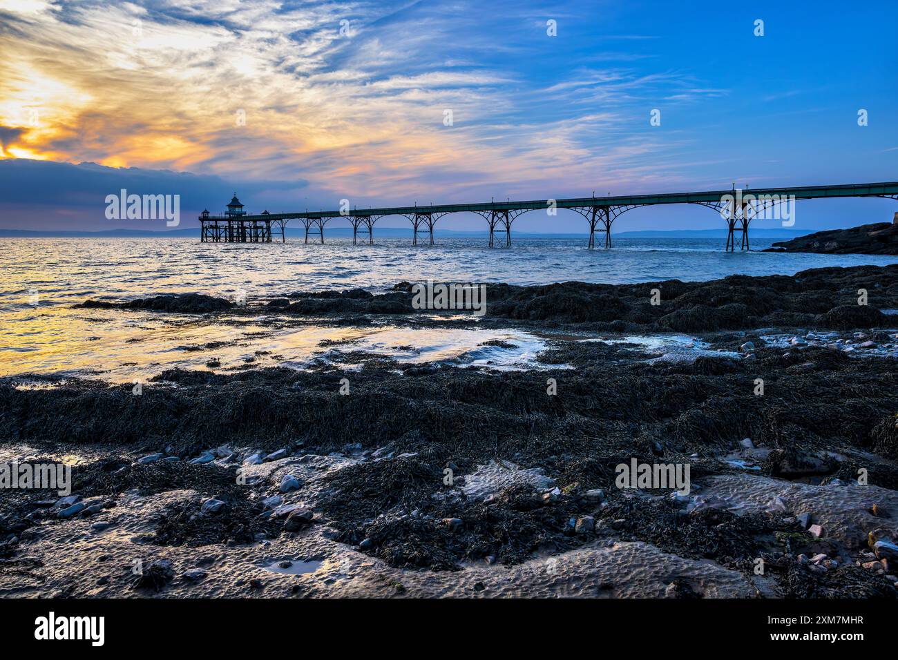 Clevedon Pier, UK taken with sunset just before the blue hour. Clevedon, UK Stock Photo