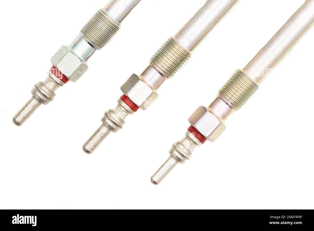 Rod ceramic glow plugs for a diesel engine on a white background, close ...