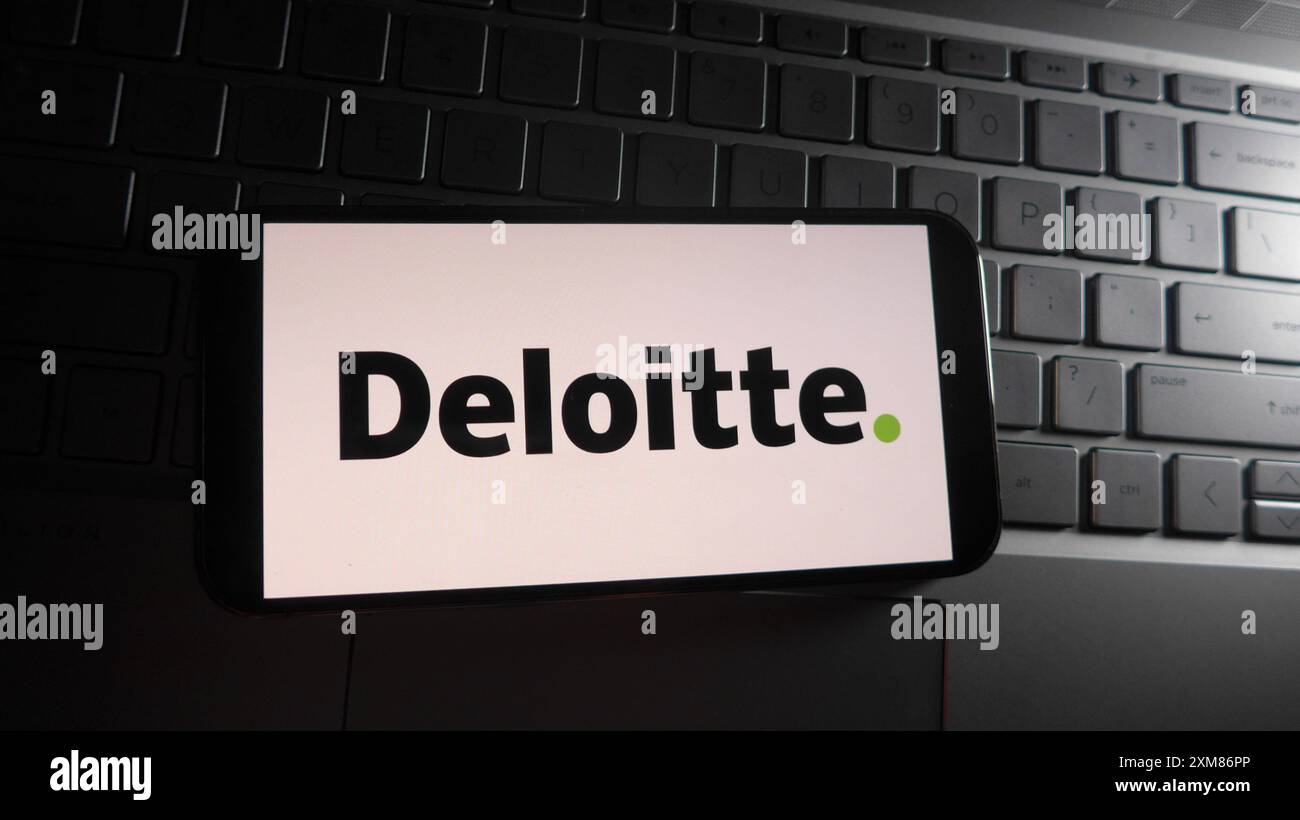 In this photo illustration, Deloitte logo is displayed on a smartphone ...