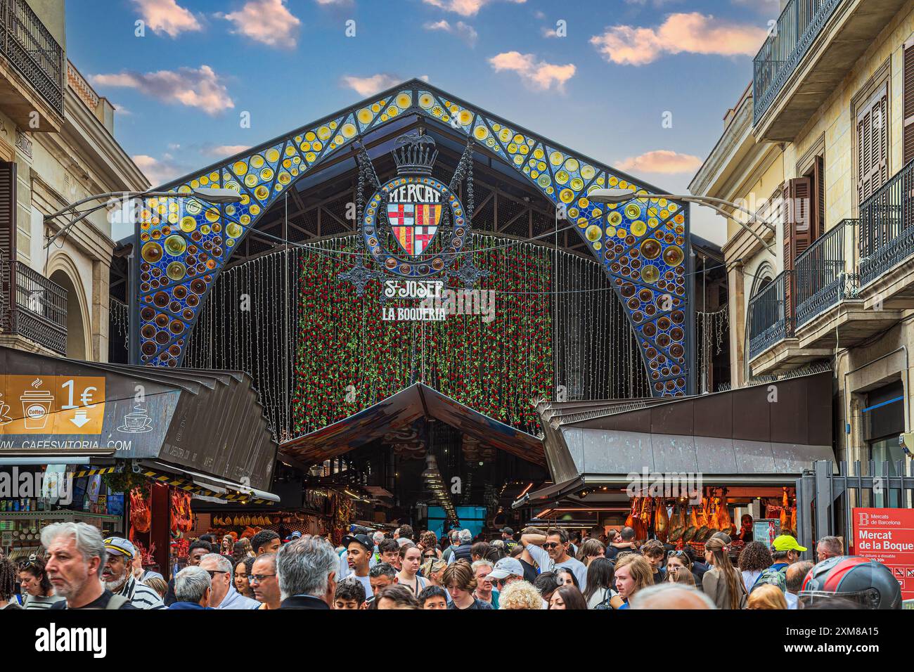 The Mercado de San José de la Boquería - legs of Serrano ham Stock Photo -  Alamy