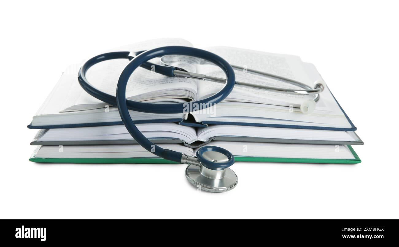 One new medical stethoscope and books isolated on white Stock Photo - Alamy