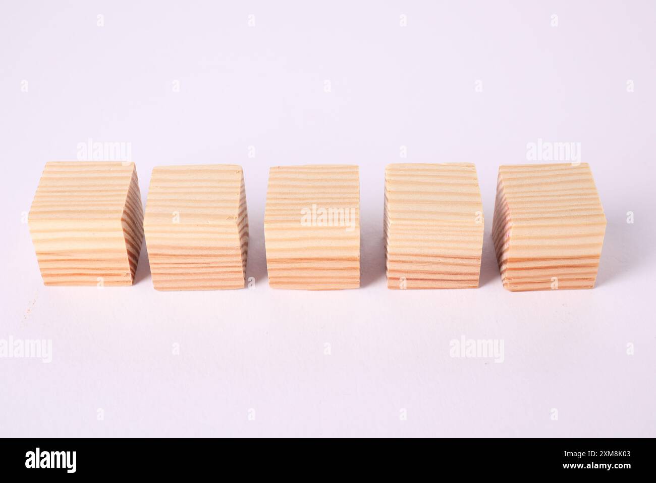Many blank wooden cubes isolated on white Stock Photo - Alamy