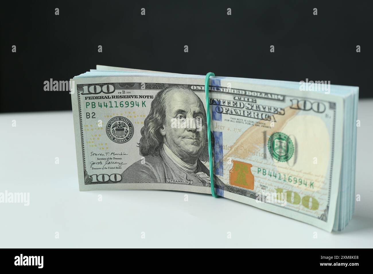 Banknotes Bundle Bundle of dollar banknotes on white background Stock Photo - Alamy