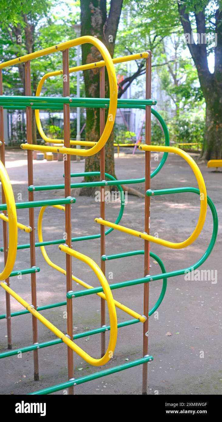 The yellow joyful climbing frame for child and kids in Japan playground Stock Photo