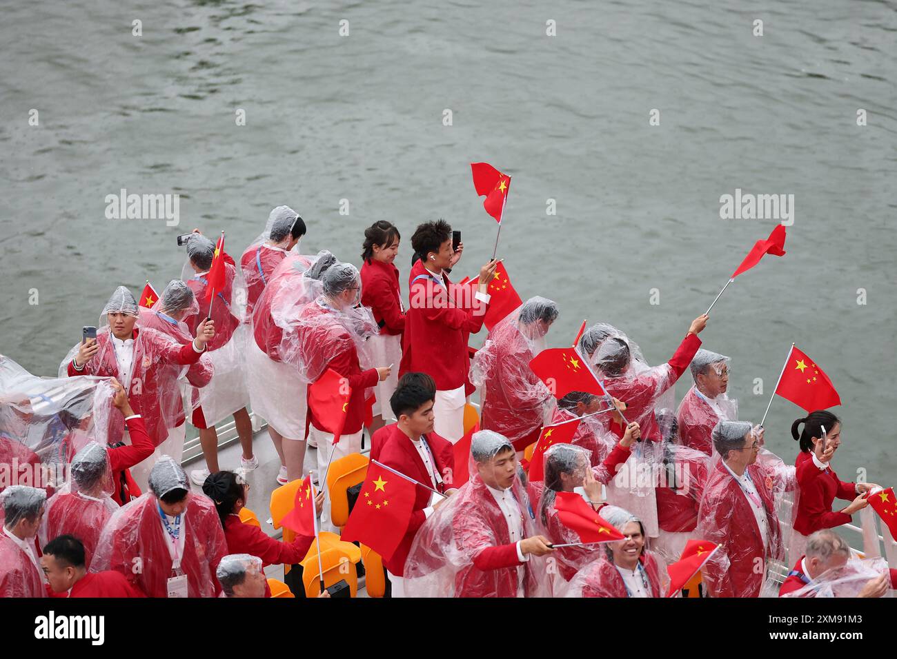 (240726) -- PARIS, July 26, 2024 (Xinhua) -- Members of the Chinese delegation are seen during the opening ceremony of the Paris 2024 Olympic Games in Paris, France, July 26, 2024. (Xinhua/Li Gang) Stock Photo