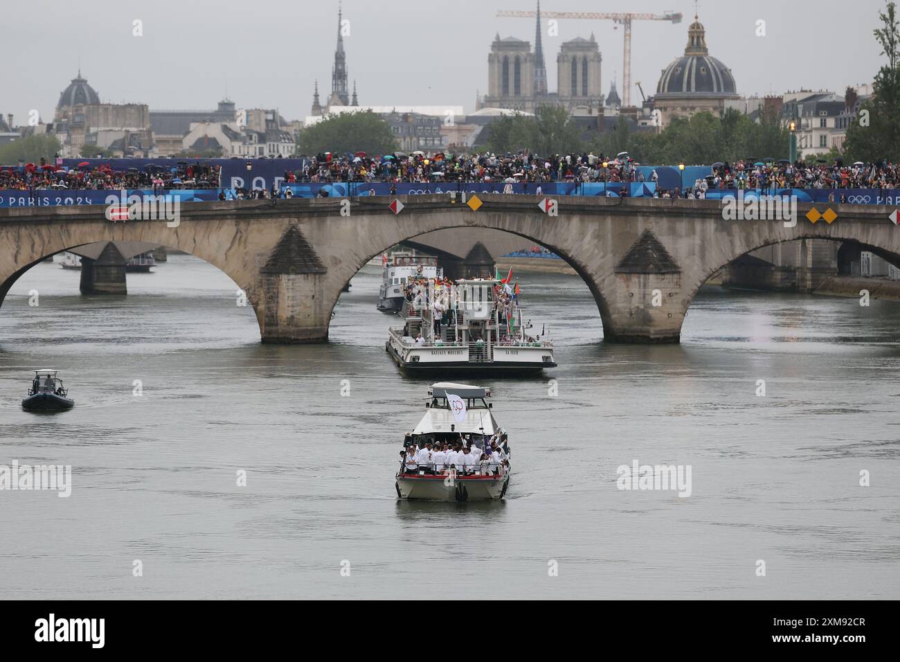 (240726) -- PARIS, July 26, 2024 (Xinhua) -- Members of delegations are seen during the opening ceremony of the Paris 2024 Olympic Games in Paris, France, July 26, 2024. (Xinhua/Li Gang) Stock Photo