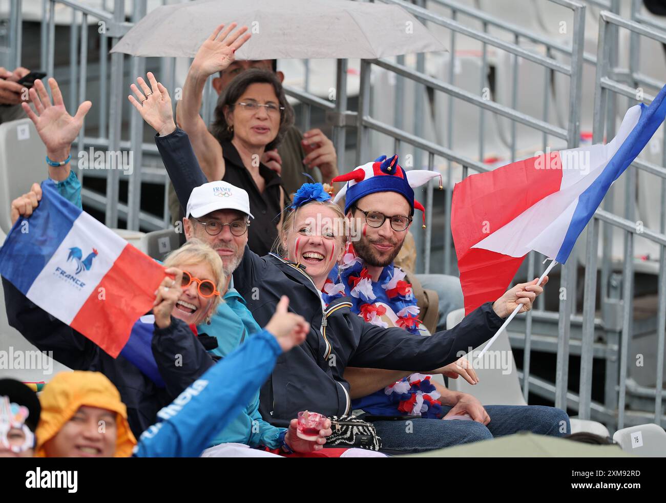 (240726) -- PARIS, July 26, 2024 (Xinhua) -- Spectators are seen during the opening ceremony of the Paris 2024 Olympic Games in Paris, France, July 26, 2024. (Xinhua/Li Gang) Stock Photo