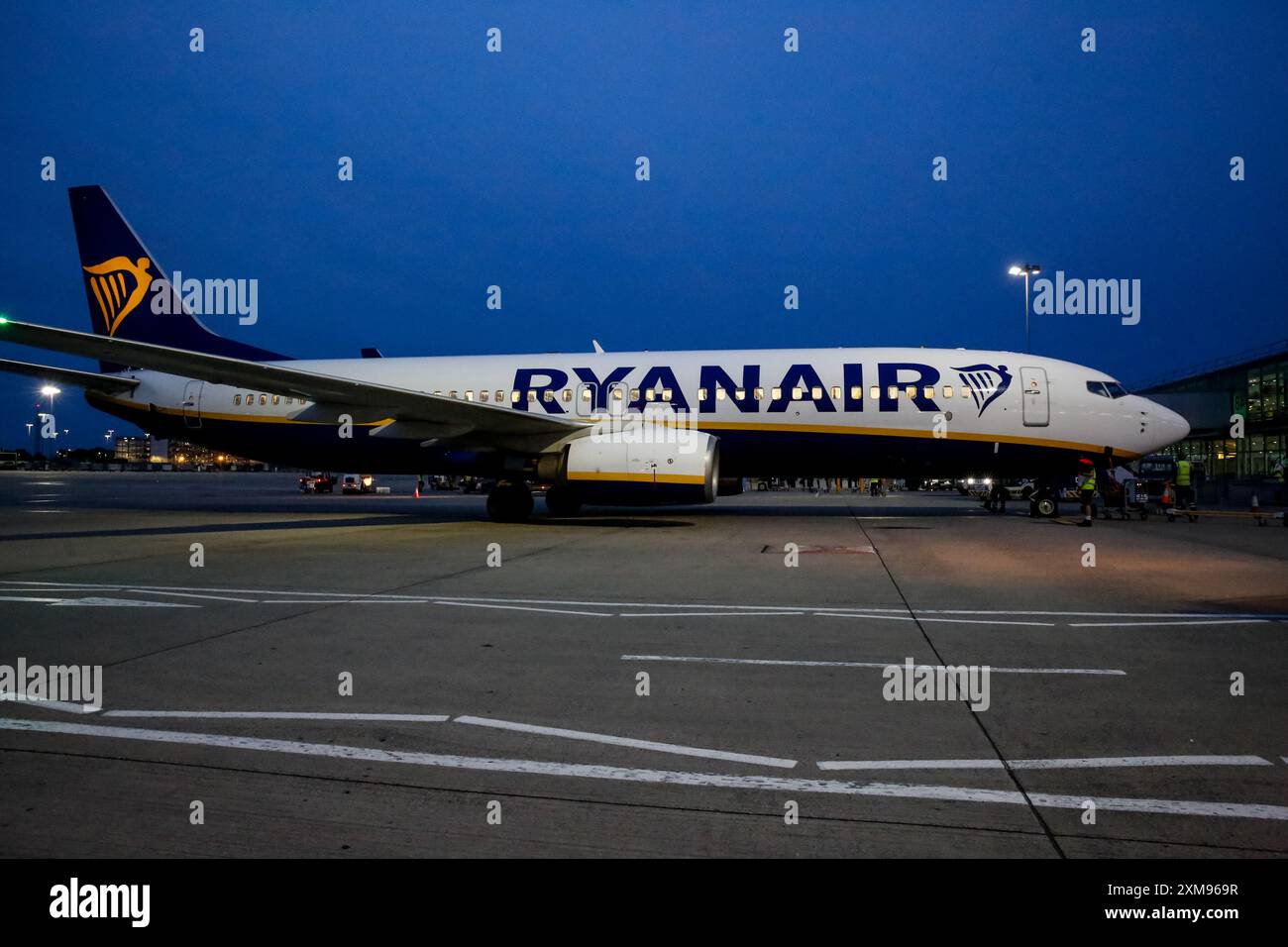 Ryanair plane is seen in London Stansted Airport. London Stansted Airport is an international airport located about 30 miles north of Central London. It's one of the major airports serving the London area. Stock Photo