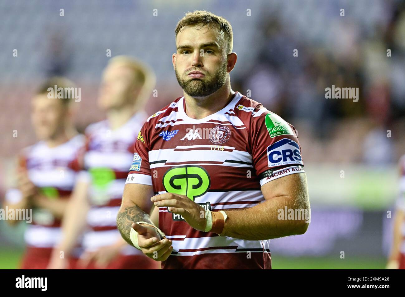 Kaide Ellis of Wigan Warriors dejected at full time during the Betfred Super League Round 19 match Wigan Warriors vs Warrington Wolves at DW Stadium, Wigan, United Kingdom, 26th July 2024  (Photo by Cody Froggatt/News Images) Stock Photo