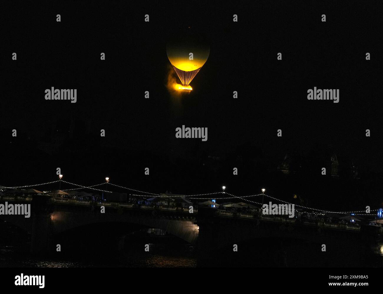 A general view of the Olympic Cauldron rising above Paris following the ...