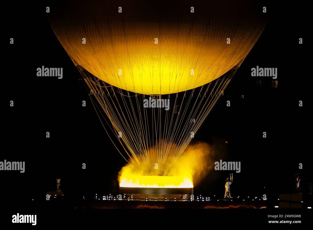 A detailed view of the Olympic Cauldron in the sky after being lit by ...