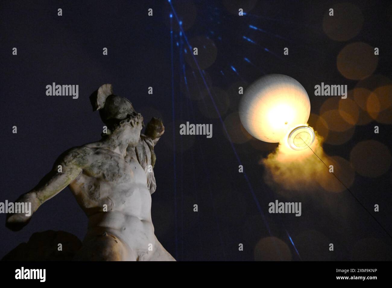 Paris, France. 26th July, 2024. The Olympic cauldron, with the flame ...