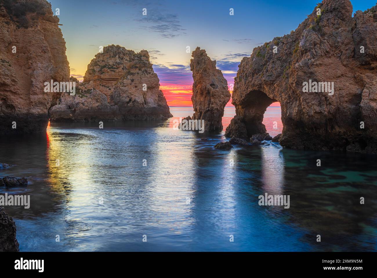 Ponta da Piedade is a headland with a group of rock formations along the coastline of the town of Lagos, in the Portuguese region of the Algarve. Stock Photo