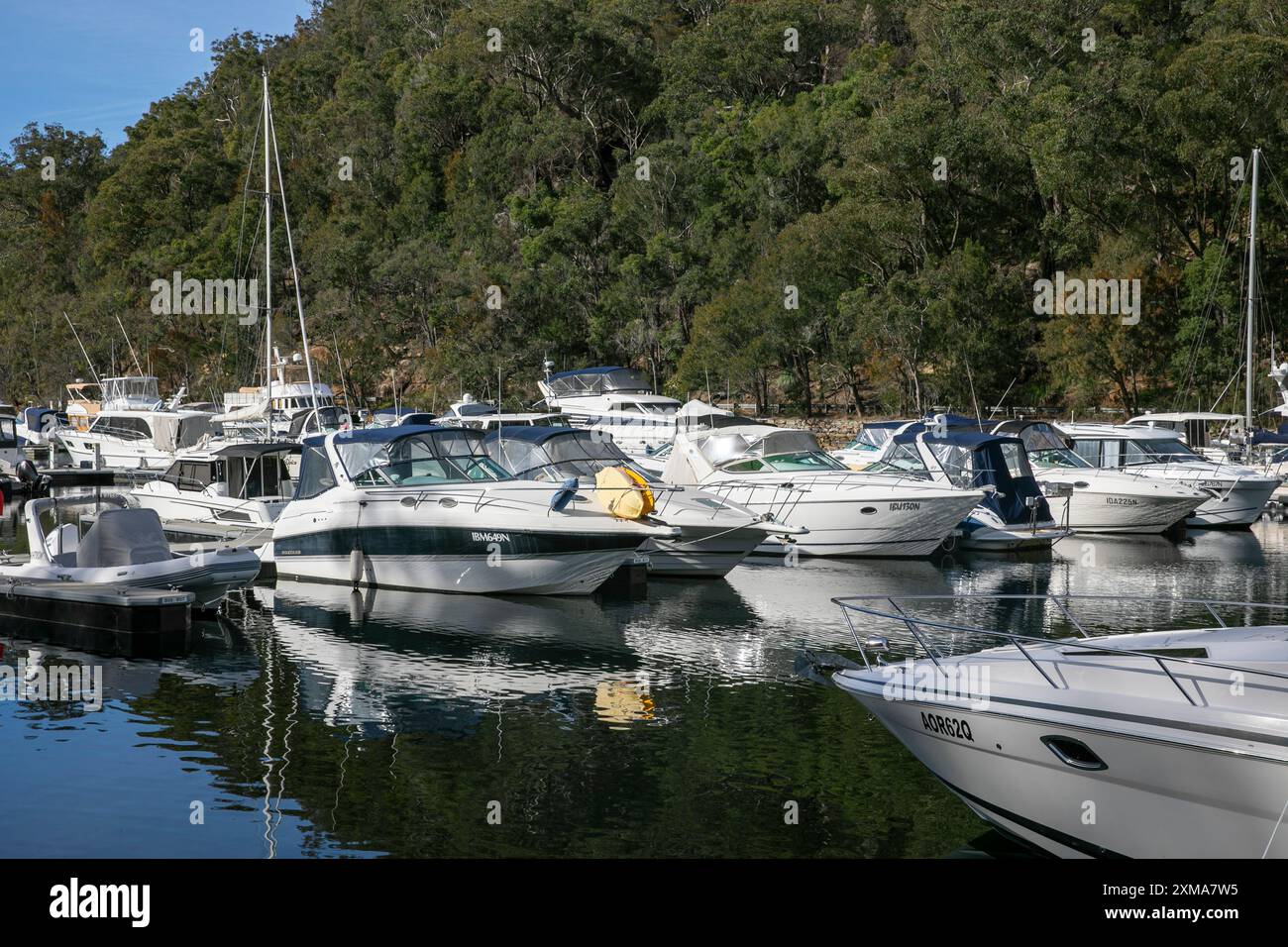 Australian boat marina, D'Albora marina at Akuna Bay in Ku-ring -gai chase national park, pleasure and recreational craft berthed, NSW,Australia Stock Photo
