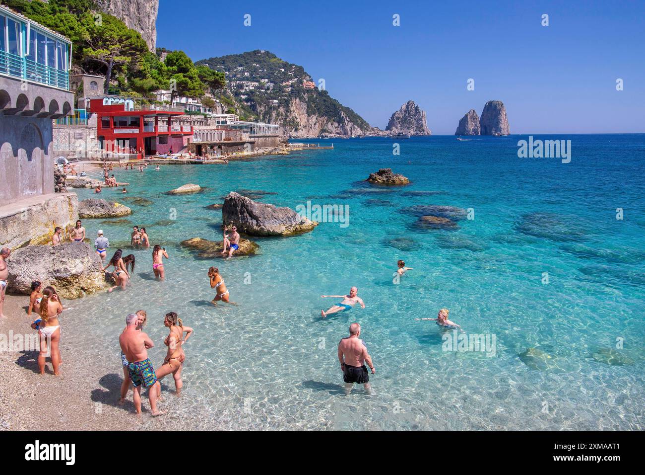 Marina Piccola bay on the south coast with the Faraglioni rocks, the ...