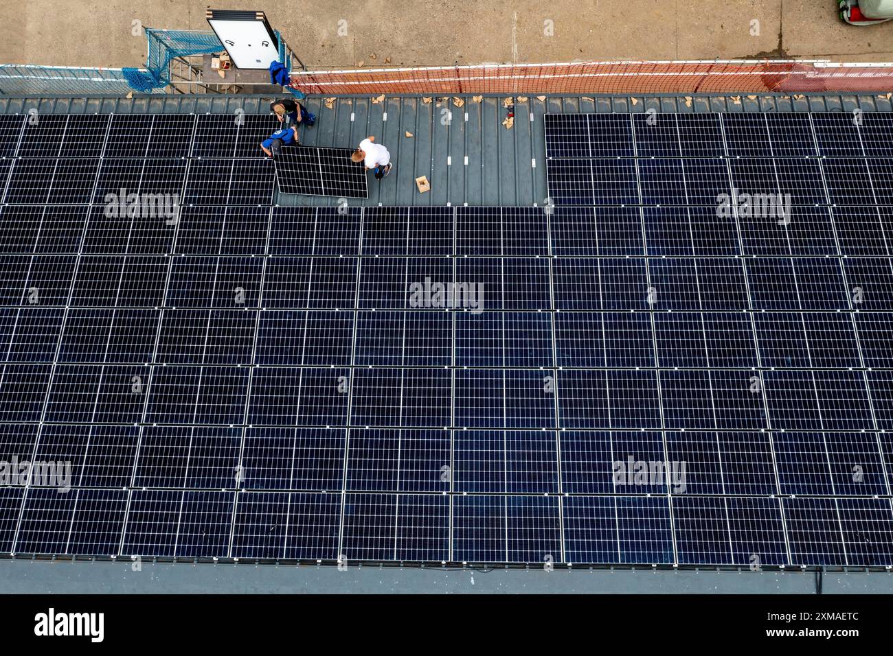 Installation of solar modules on the roof of a barn on a farm, over 210 ...