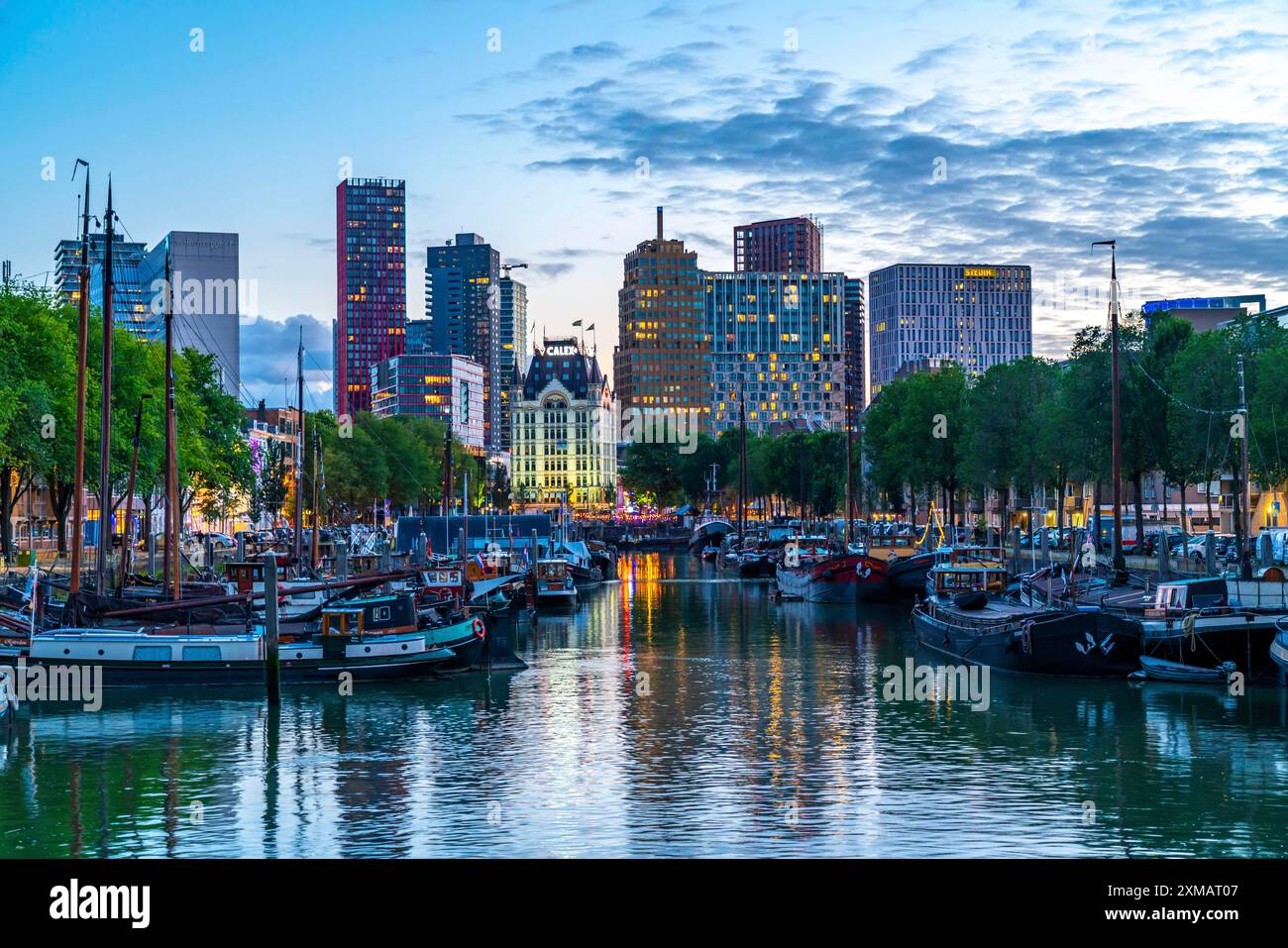 Rotterdam city centre, Oudehaven, historic harbour, The White House, historic office building, historic ships, modern city backdrop, Netherlands Stock Photo