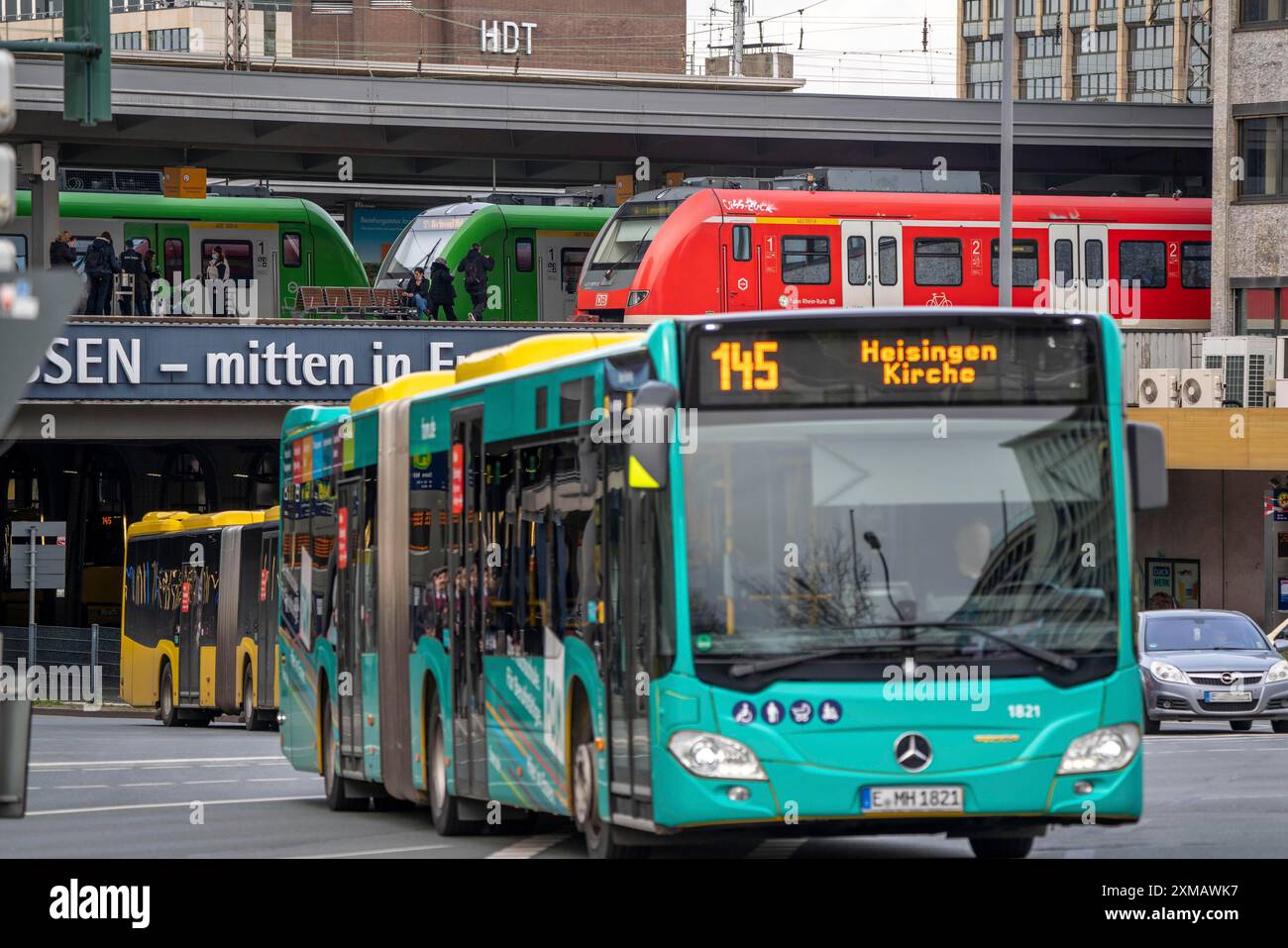 Local transport, junction at the main railway station, local trains, city bus, in the city centre of Essen, North Rhine-Westphalia, Germany Stock Photo