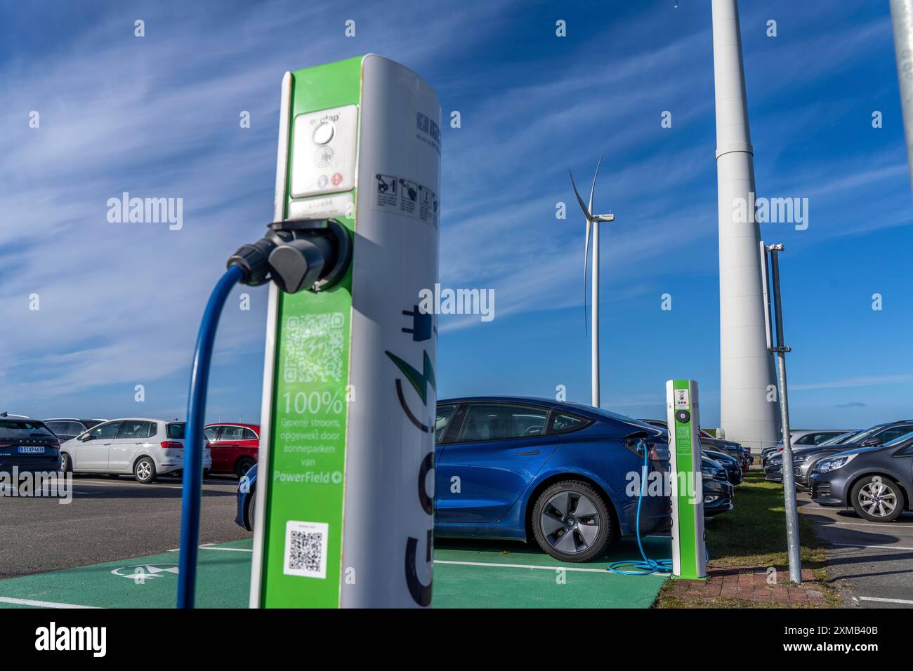 Electric car fast charging station, from the Dutch provider PowerGo, in the ferry harbour of Eemshaven, powered by renewable energy, Netherlands Stock Photo