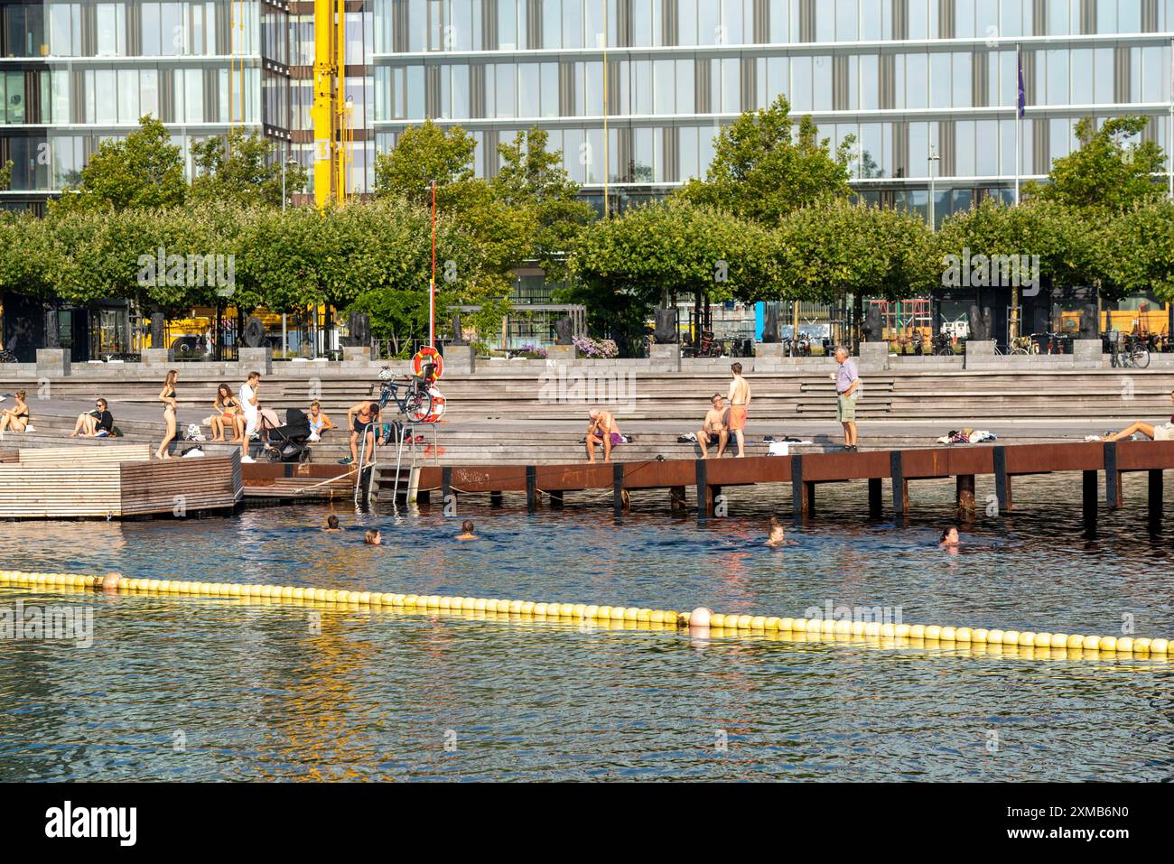 Summer, swimming in the harbour of Copenhagen, there are official bathing places, harbour baths and lidos in many places, here the Bolgen Stock Photo