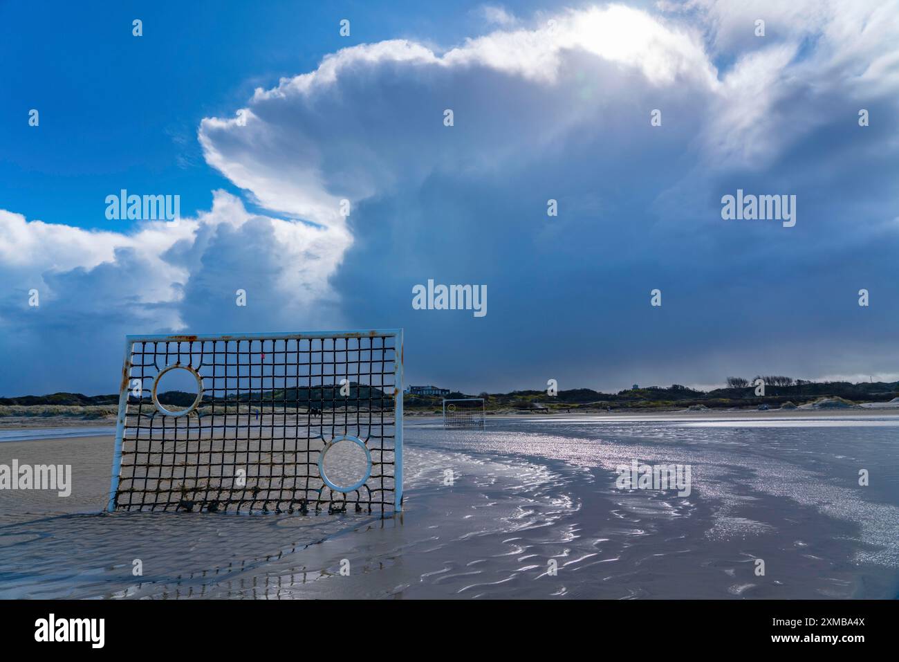 Football pitch, football field, Tor tor, on the beach, tidal creek, in the west of Borkum, island, East Frisia, winter, season, autumn, Lower Saxony Stock Photo