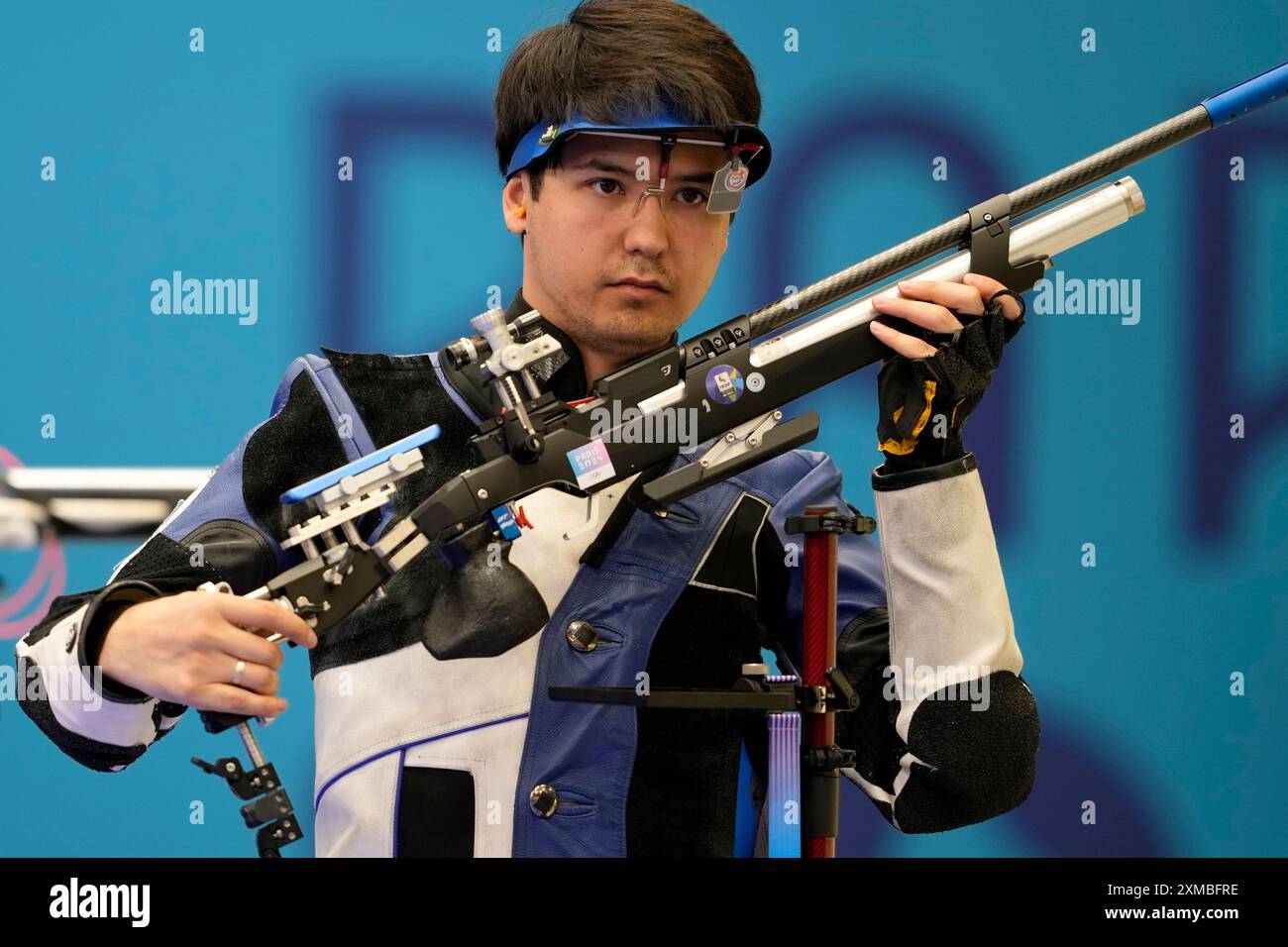 Islam Satpayev of Kazakhstan reacts as he competes for the bronze medal