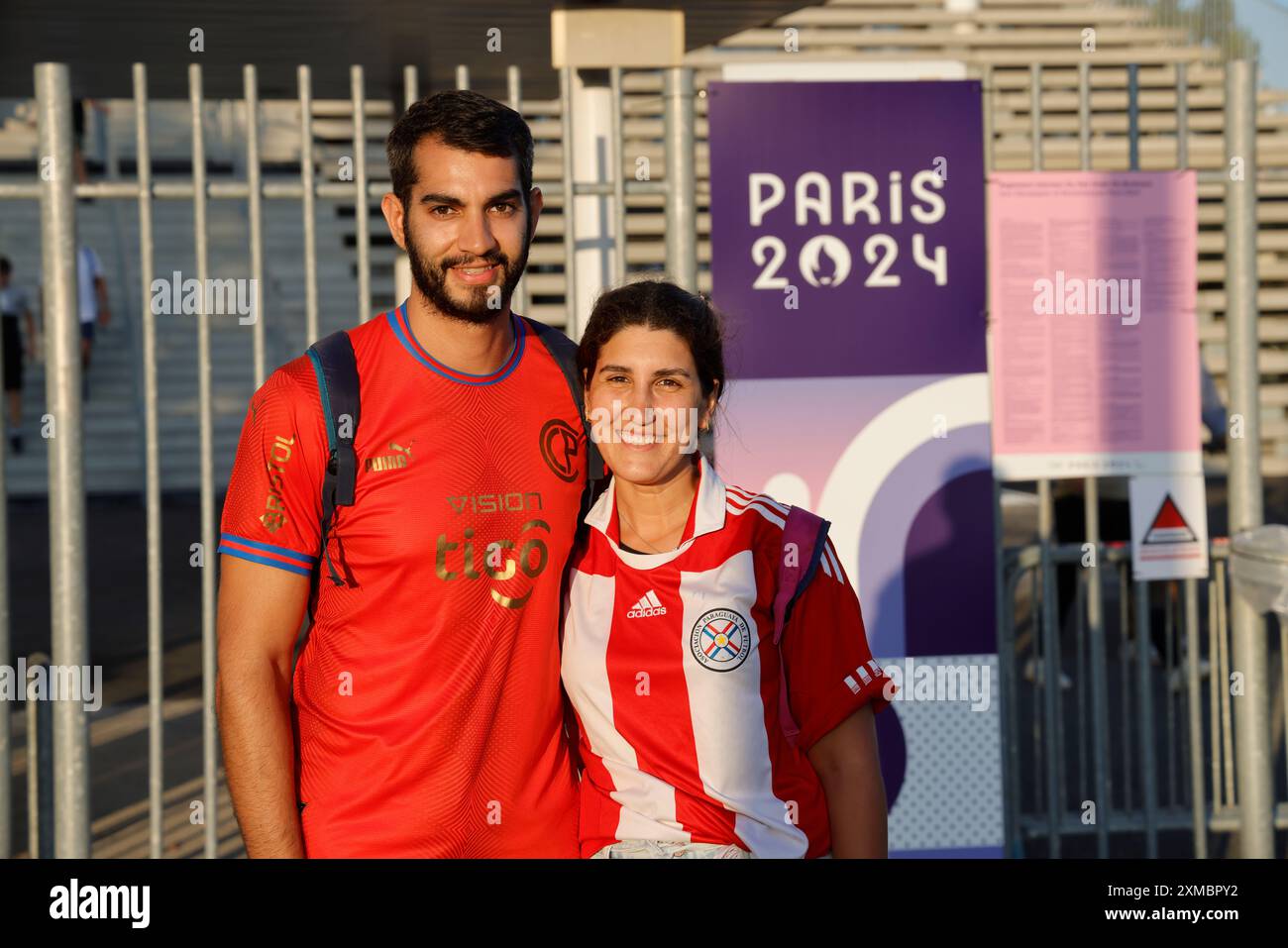 People of the Republic of Paraguay. Paraguay fans during the Paris 2024 Olympic Games. Exit of the Japan-Paraguay men's football match (Score: Japan 5 Stock Photo