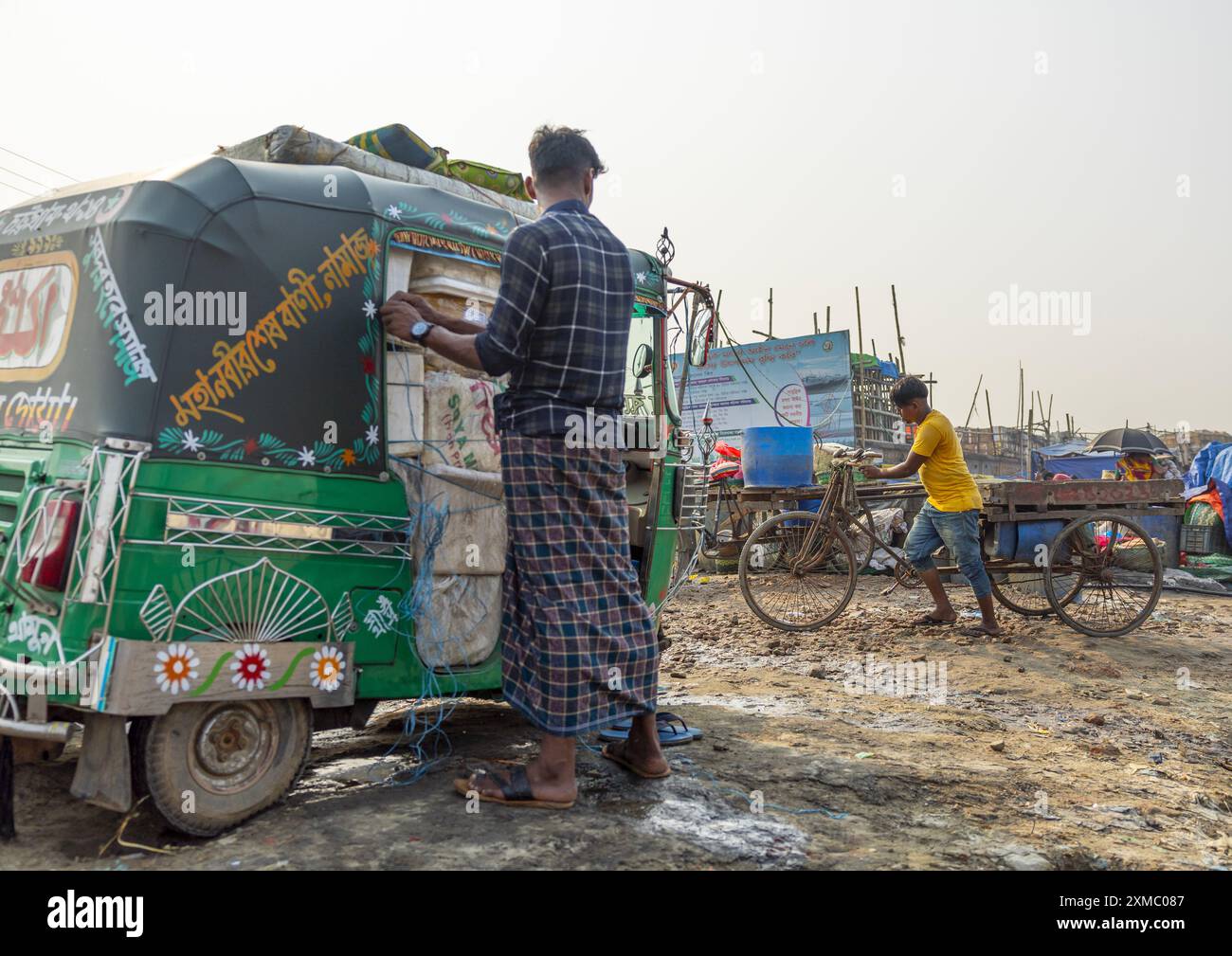 Rickshaws in the morning fish market, Chittagong Division, Chittagong ...