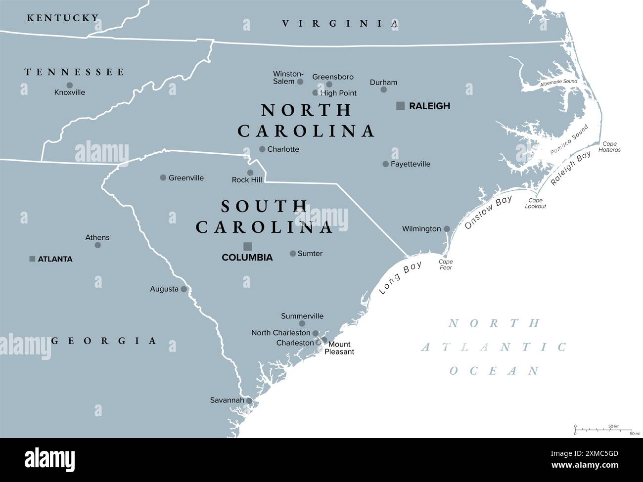 The Carolinas or simply Carolina, U.S. states North and South Carolina, gray political map, with borders and capitals Raleigh and Columbia. Stock Photo