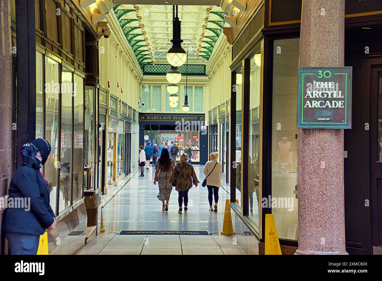 Glasgow, Scotland, UK. 27th July, 2024: UK Weather: The argyle arcade a victorian mall which is one of the oldest outside of paris where the idea came from. Unseasonal  but dry saw tourists and locals take to the streets in the city centre. Credit Gerard Ferry/Alamy Live News Stock Photo