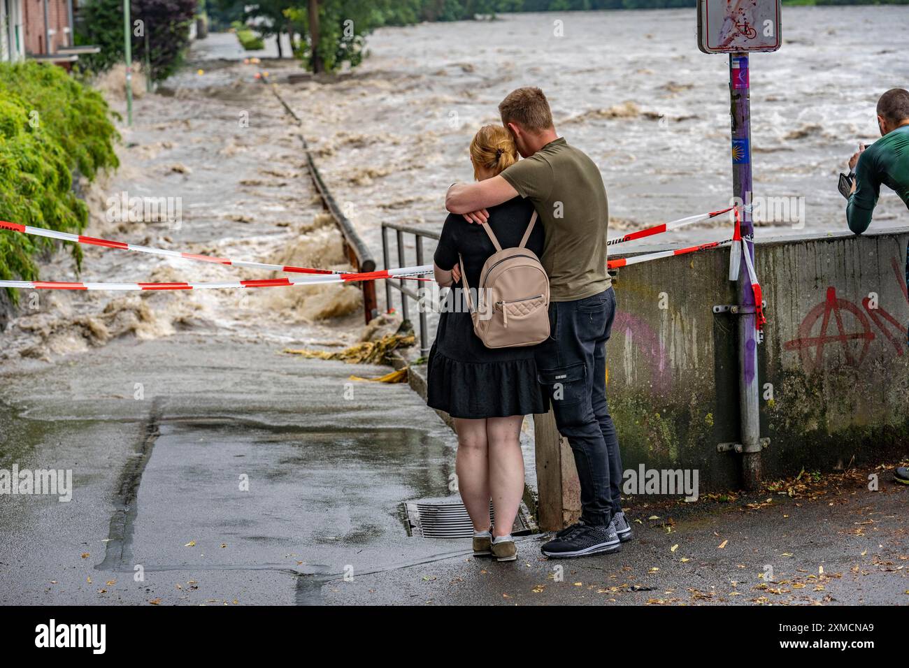 Weir of the Lake Baldeney in Essen, the masses of water roar through the open weirs, spectators, onlookers, high water on the Ruhr, after long heavy Stock Photo