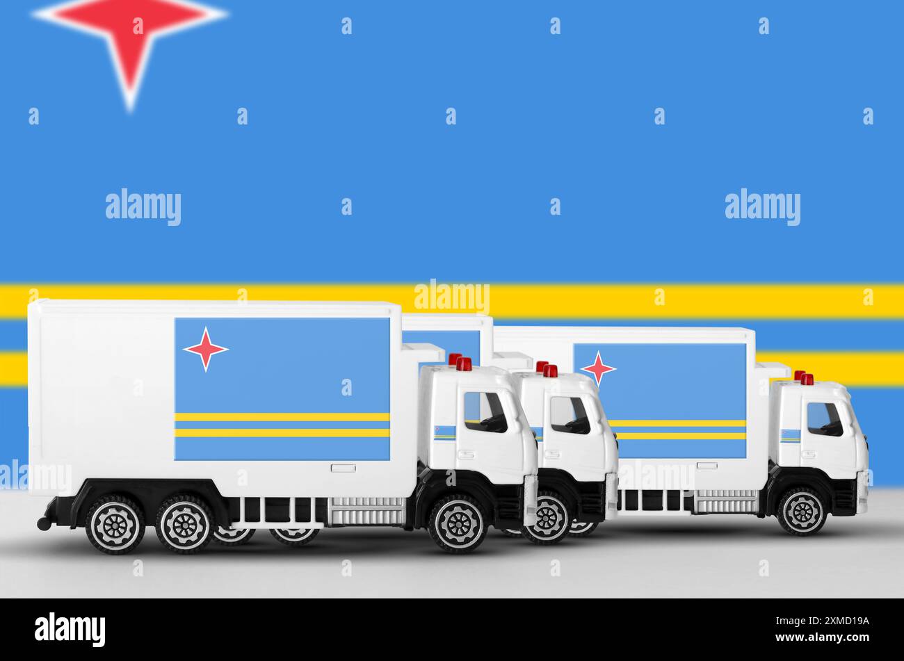 Aruba flag depicted on side wall of white delivery van close up. Shipping and local delivery concept Stock Photo
