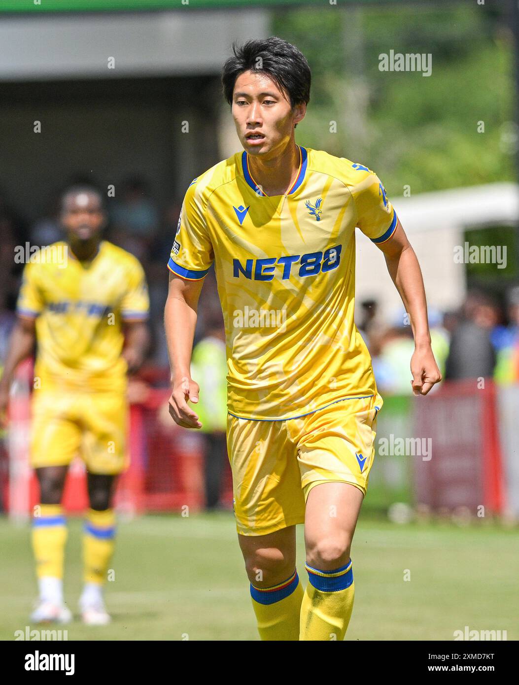 Daichi Kamada of Crystal Palaces during the pre-season friendly match between Crawley Town and Crystal Palace at the Broadfield Stadium  , Crawley , UK - 27th July,  2024. Photo Simon Dack / Telephoto Images  Editorial use only. No merchandising. For Football images FA and Premier League restrictions apply inc. no internet/mobile usage without FAPL license - for details contact Football Dataco Stock Photo