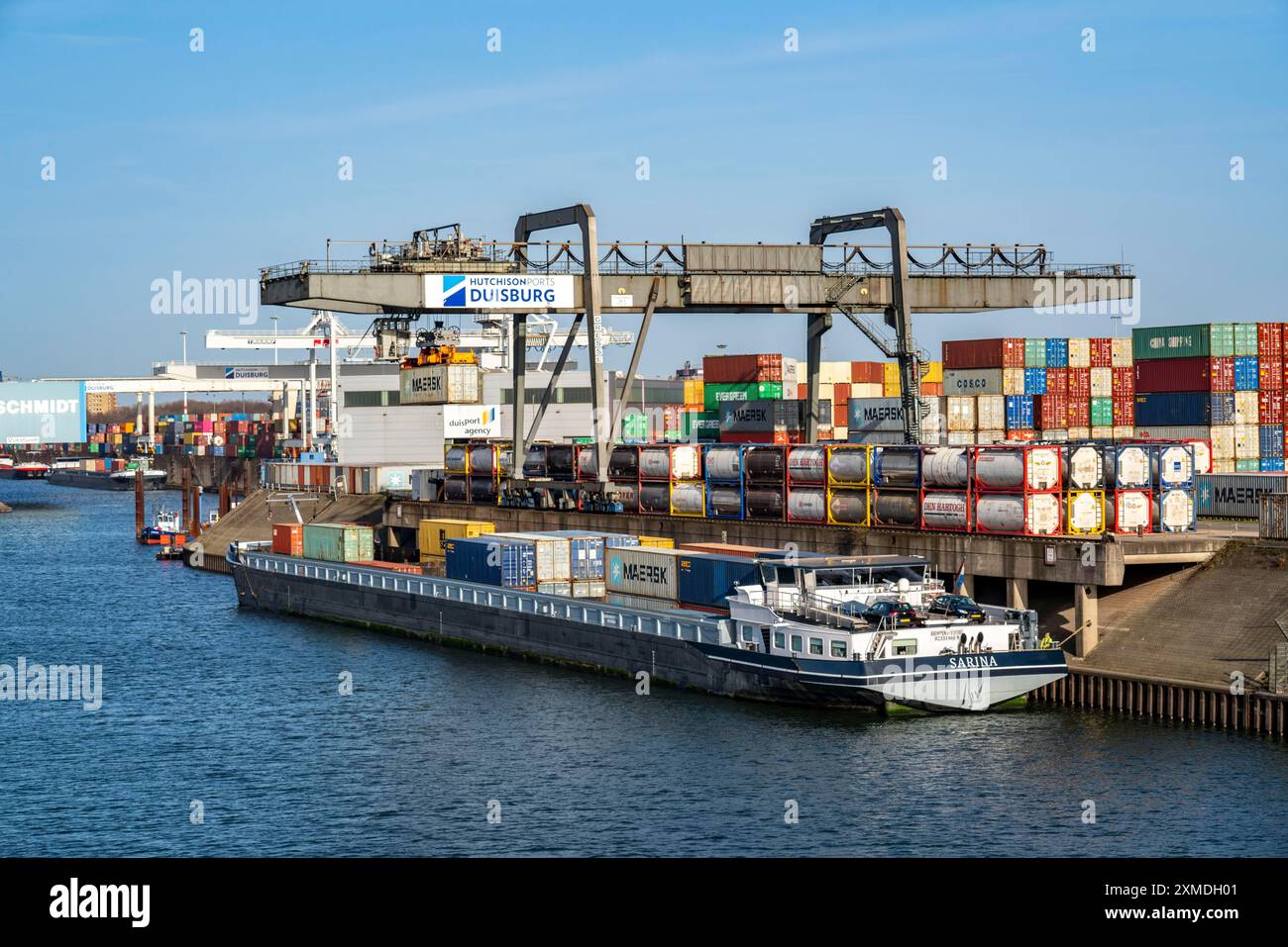 Port of Duisburg Ruhrort, Container freighter being loaded and unloaded ...
