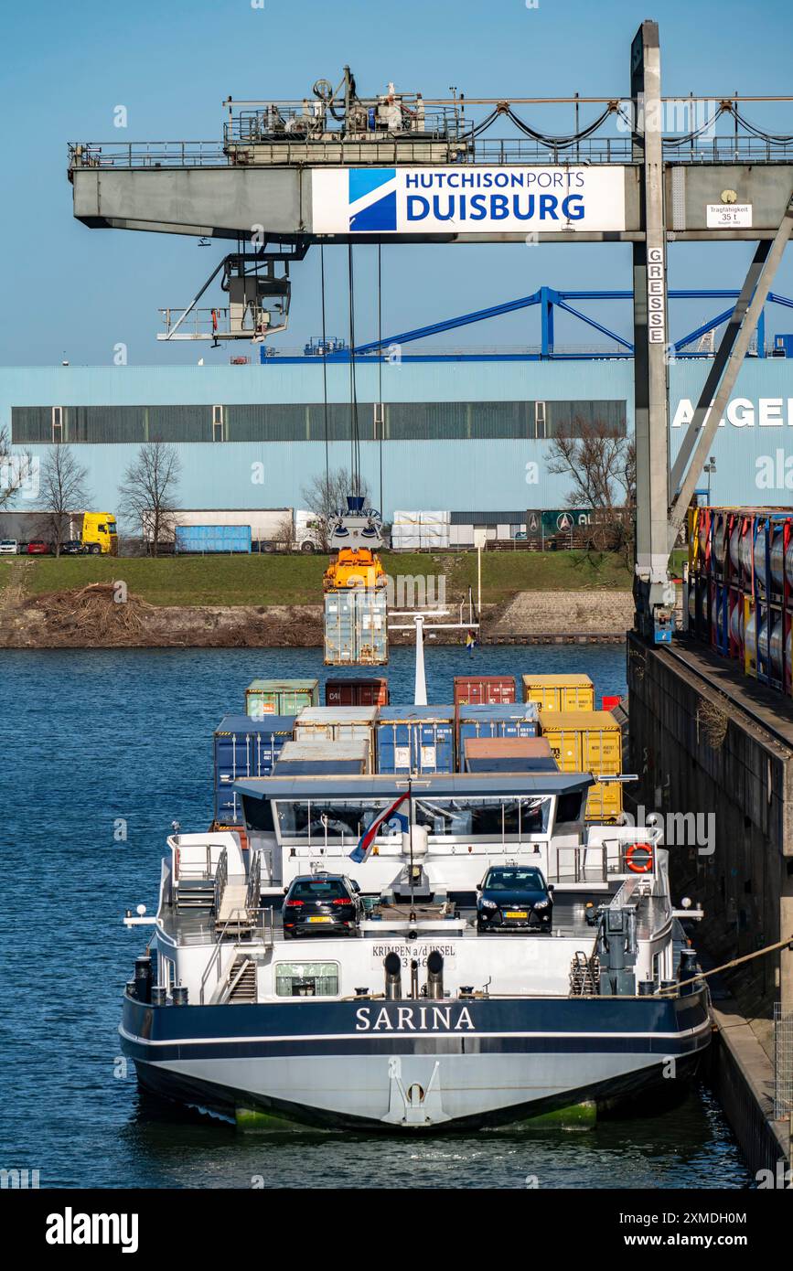 Port of Duisburg Ruhrort, Container freighter being loaded and unloaded ...
