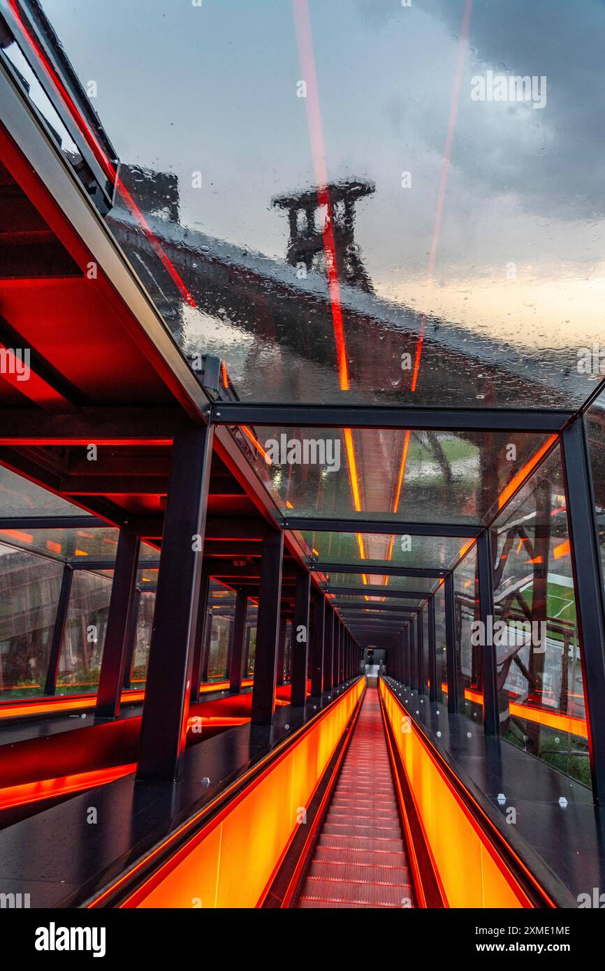 Zeche Zollverein, rainy day, ride on the escalator of the Ruhr Museum, in the coal washing plant, view of the double headframe of shaft XII, through Stock Photo