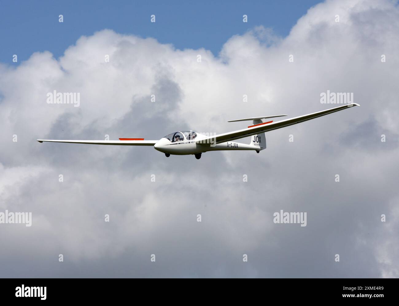 A Schleicher ASK-21 glider of Southdown Gliding Club approaching a private airfield in West Sussex Stock Photo