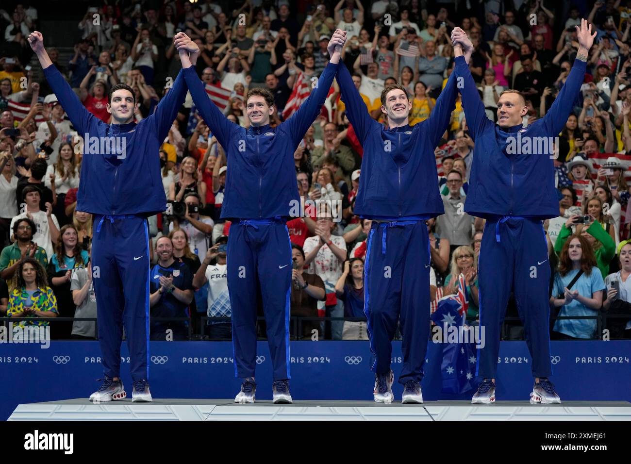 The United States men's 4x100meter freestyle relay team celebrates on
