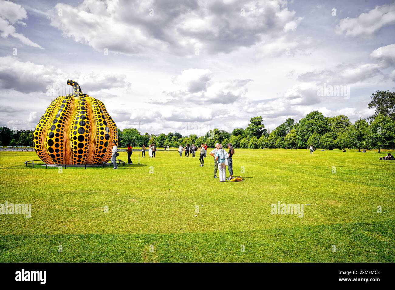 Yayoi Kusama  iconic pumpkin sculpture, Hyde Park, Kensington Gardens, London, England, United Kingdom Stock Photo