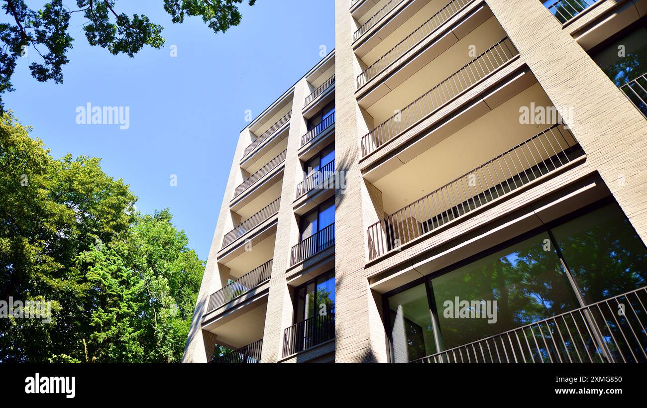 Image showcasing Modern residential building with new apartments in a green residential ...