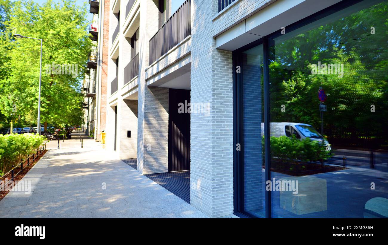 Image showcasing Modern residential building with new apartments in a green residential ...